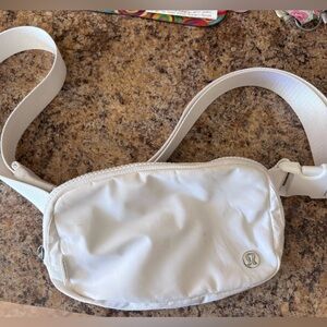 White XL Lululemon bum bag.  Used a couple times! Great shape!